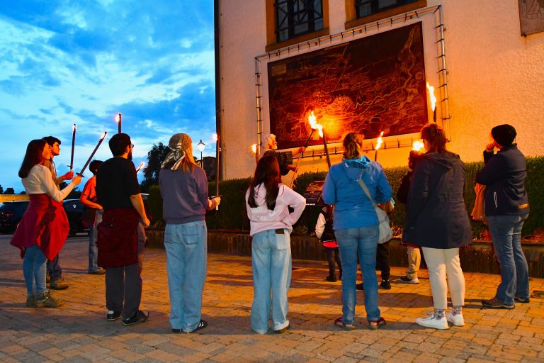 Visite guidée de Neufchâteau aux flambeaux.